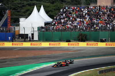 Max Verstappen (NLD) Red Bull Racing RB16B and Lewis Hamilton (GBR) Mercedes AMG F1 W12 battle for the leads of the race.