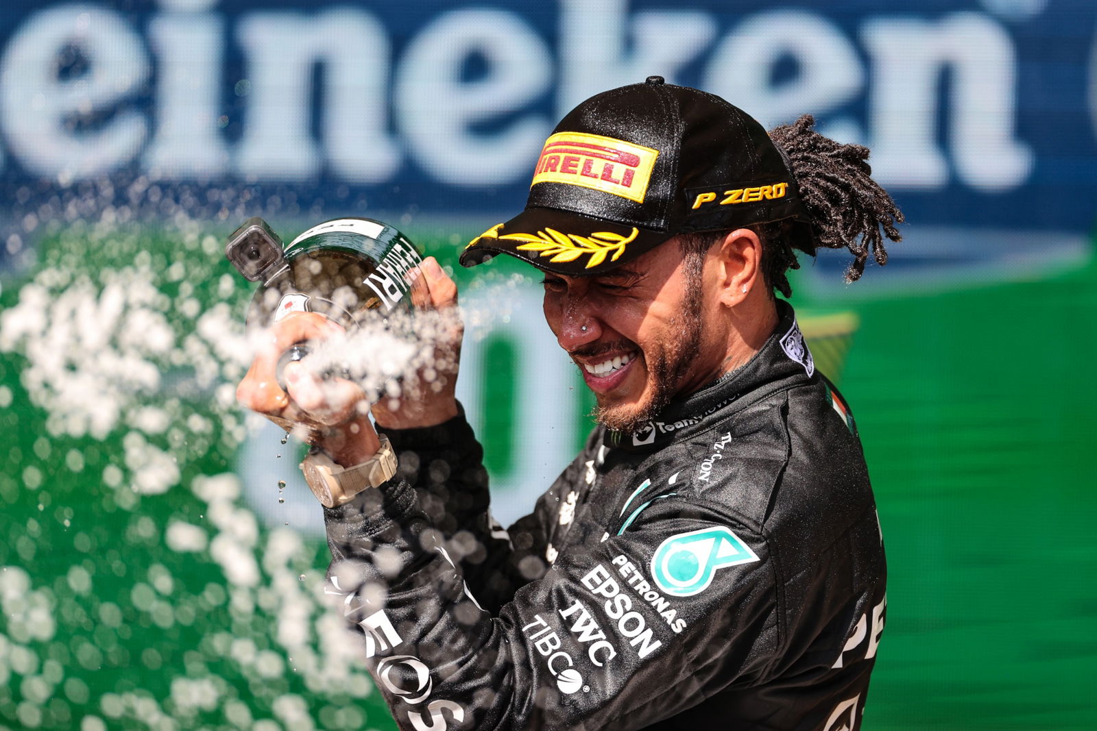 Race winner Lewis Hamilton (GBR) Mercedes AMG F1 celebrates on the podium.