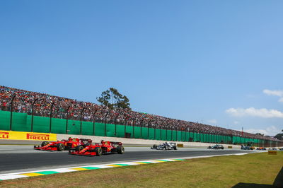 Charles Leclerc (MON) Ferrari SF-21 and Carlos Sainz Jr (ESP) Ferrari SF-21 battle for position at the start of the race.