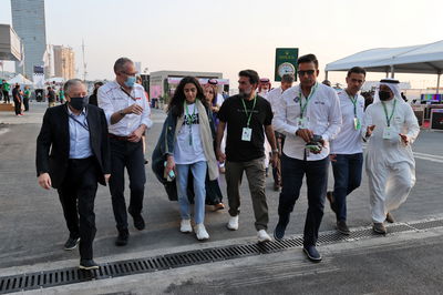 Jean Todt (FRA) FIA President and Stefano Domenicali (ITA) Formula One President and CEO with paddock guests.