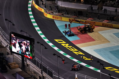 Marshals remove the Williams Racing FW43B of George Russell (GBR) Williams Racing and the Red Bull Racing RB16B of Sergio Perez (MEX) Red Bull Racing.