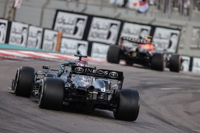 Lewis Hamilton (GBR), Mercedes AMG F1 and Sergio Perez (MEX), Red Bull Racing 