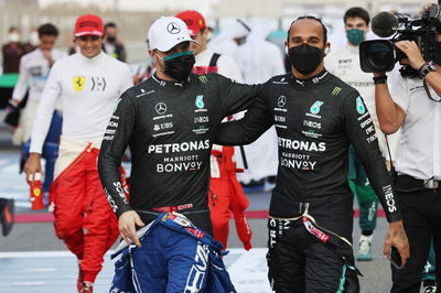 Valtteri Bottas (FIN) Mercedes AMG F1 W12 and Lewis Hamilton (GBR) Mercedes AMG F1 W12.