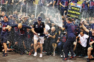 Race winner Max Verstappen (NLD) Red Bull Racing celebrates winning the World Championship with the team.