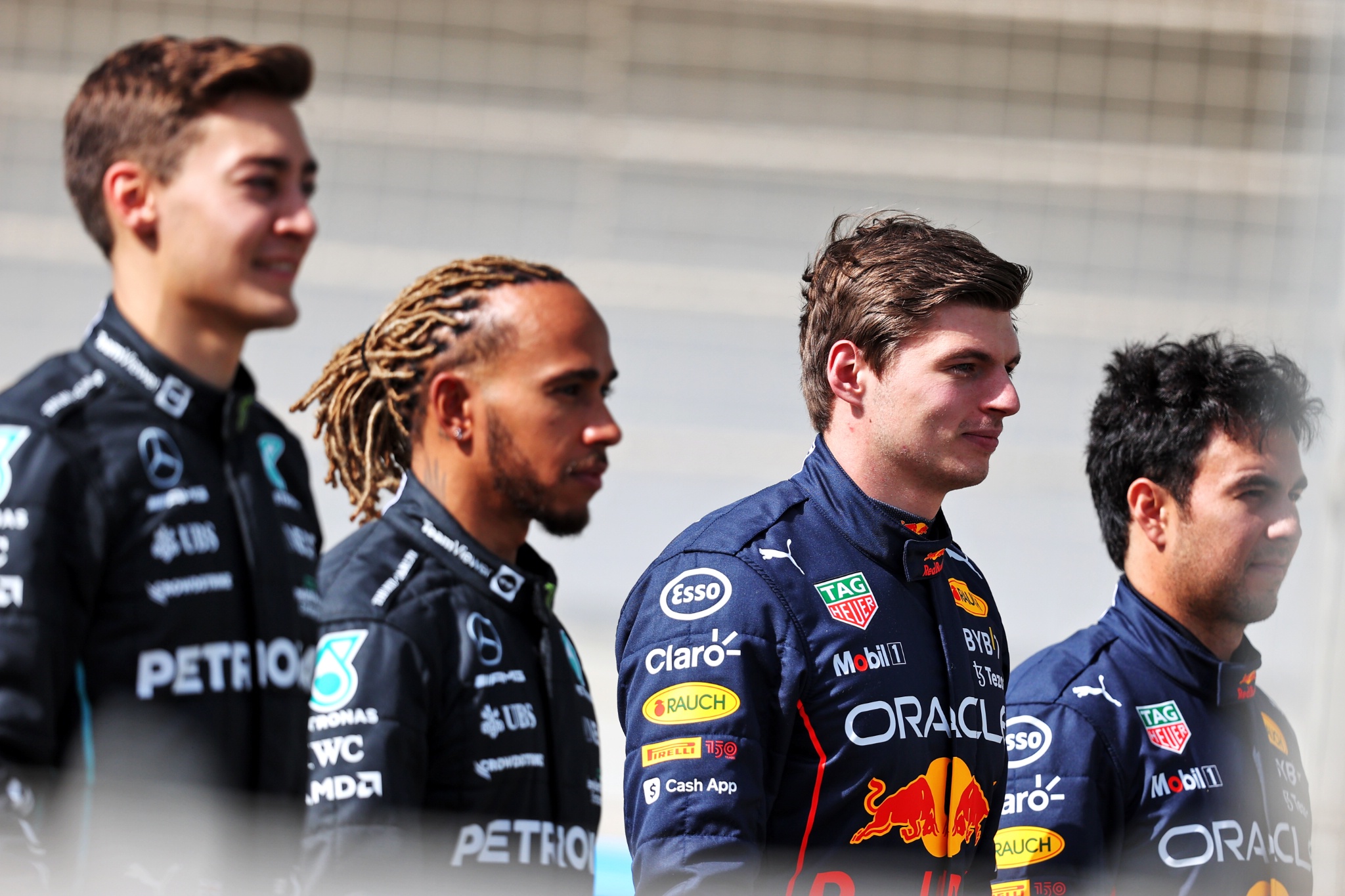 Max Verstappen (NLD) Red Bull Racing with George Russell (GBR) Mercedes AMG F1; Lewis Hamilton (GBR) Mercedes AMG F1; and Sergio Perez (MEX) Red Bull Racing.