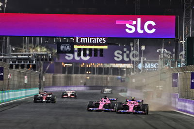 Esteban Ocon (FRA) Alpine F1 Team A522 and team mate Fernando Alonso (ESP) Alpine F1 Team A522 battle for position.