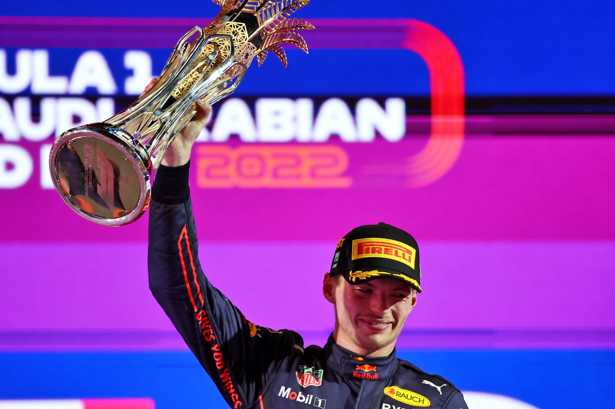 Race winner Max Verstappen (NLD) Red Bull Racing celebrates on the podium.