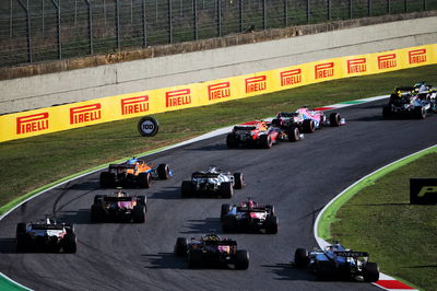 George Russell (GBR) Williams Racing FW43 and Sebastian Vettel (GER) Ferrari SF1000 at the restart of the race.