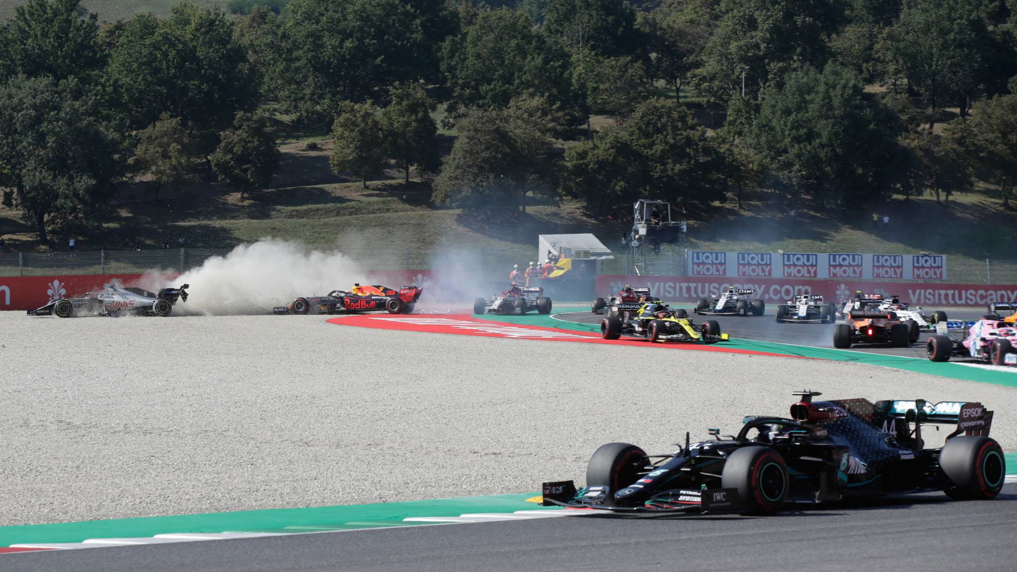 Max Verstappen (NLD) Red Bull Racing RB16 crashes out of the race with Romain Grosjean (FRA) Haas F1 Team VF-20 and Kimi Raikkonen (FIN) Alfa Romeo Racing C39.