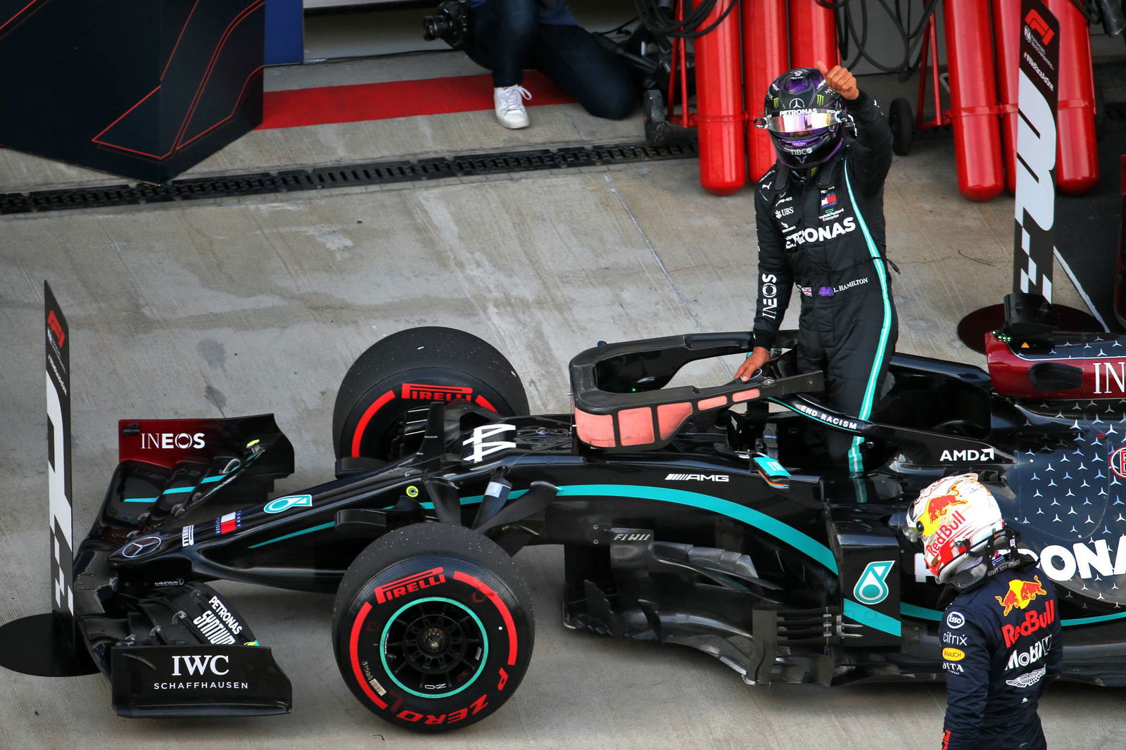 Lewis Hamilton (GBR) Mercedes AMG F1 W11 celebrates his pole position in qualifying parc ferme.