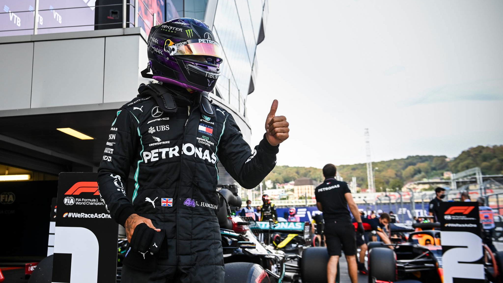 Lewis Hamilton (GBR) Mercedes AMG F1 W11 celebrates his pole position in qualifying parc ferme.