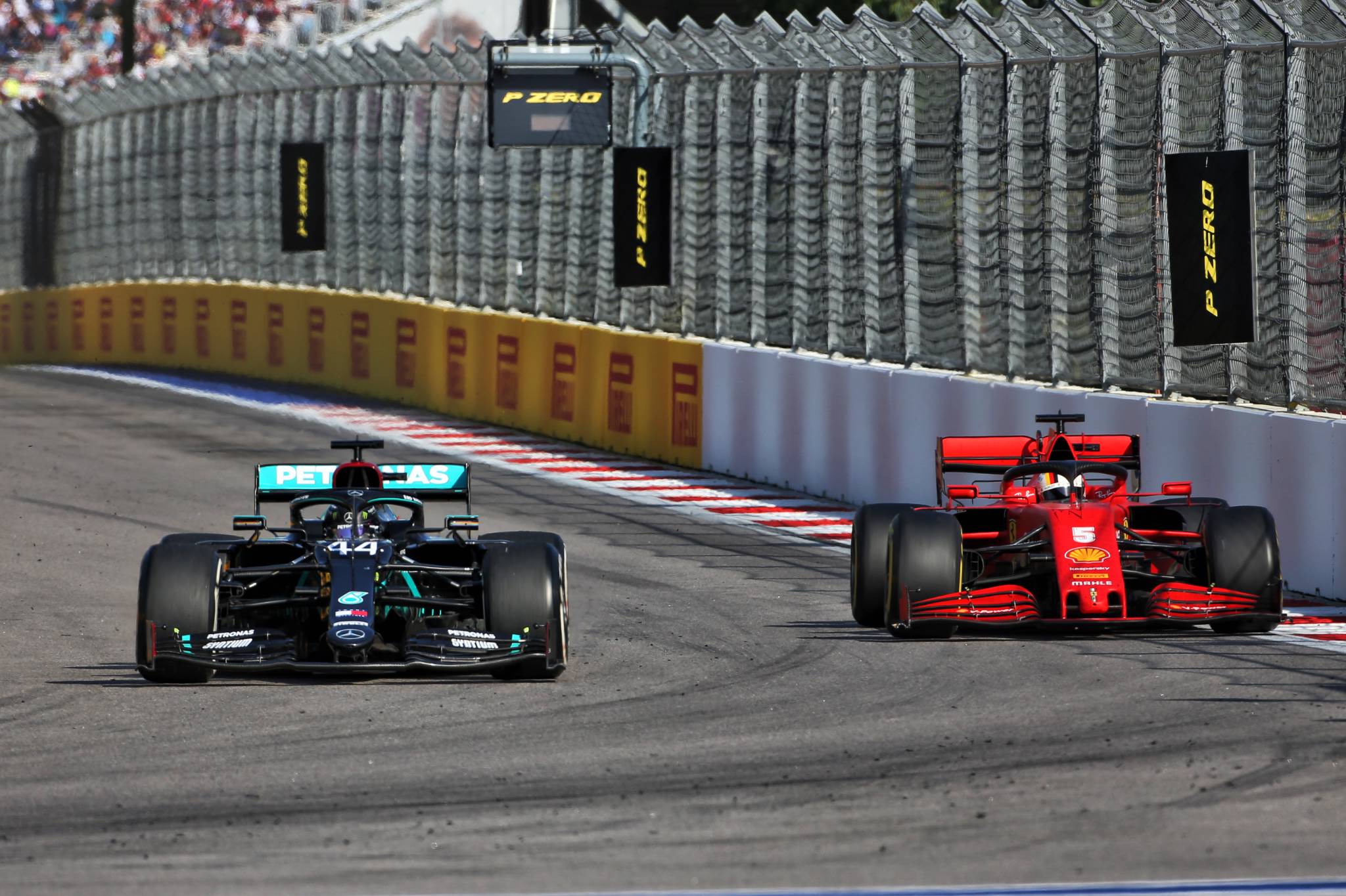 Lewis Hamilton (GBR) Mercedes AMG F1 W11 and Sebastian Vettel (GER) Ferrari SF1000.