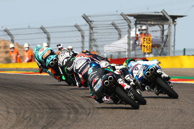 Jaume Masia leads pack, last corner, Moto3 race, Aragon MotoGP. 18 October 2020