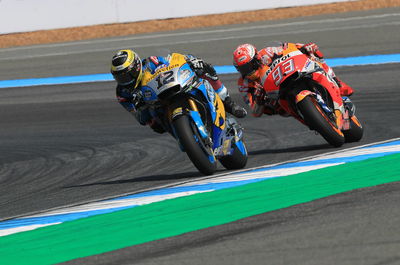 Marquez sees off Rossi for Thailand pole