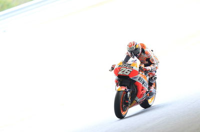 Pedrosa leads Redding in damp FP2 