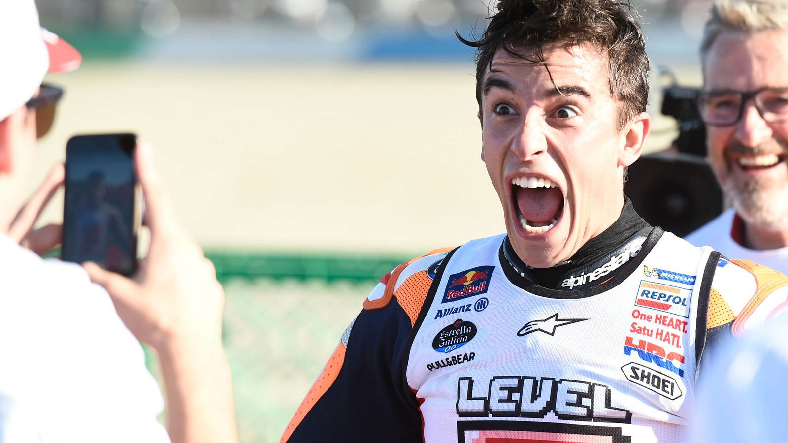 Marquez dislocates shoulder during title celebrations
