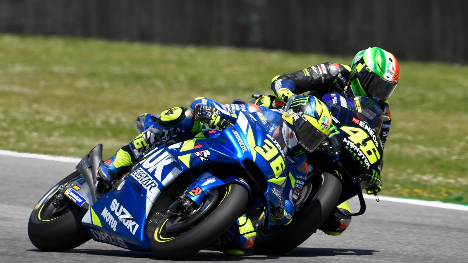 Mir scores points despite Rossi contact