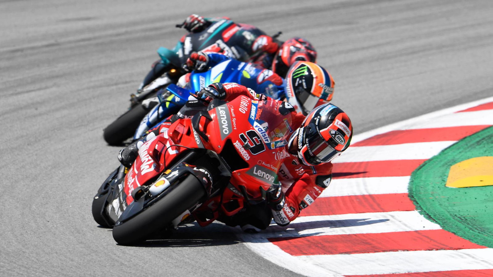 Petrucci survives rubbery brush with Rins for podium