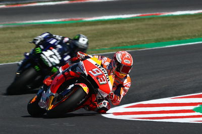 Marquez in the middle of the Yamahas
