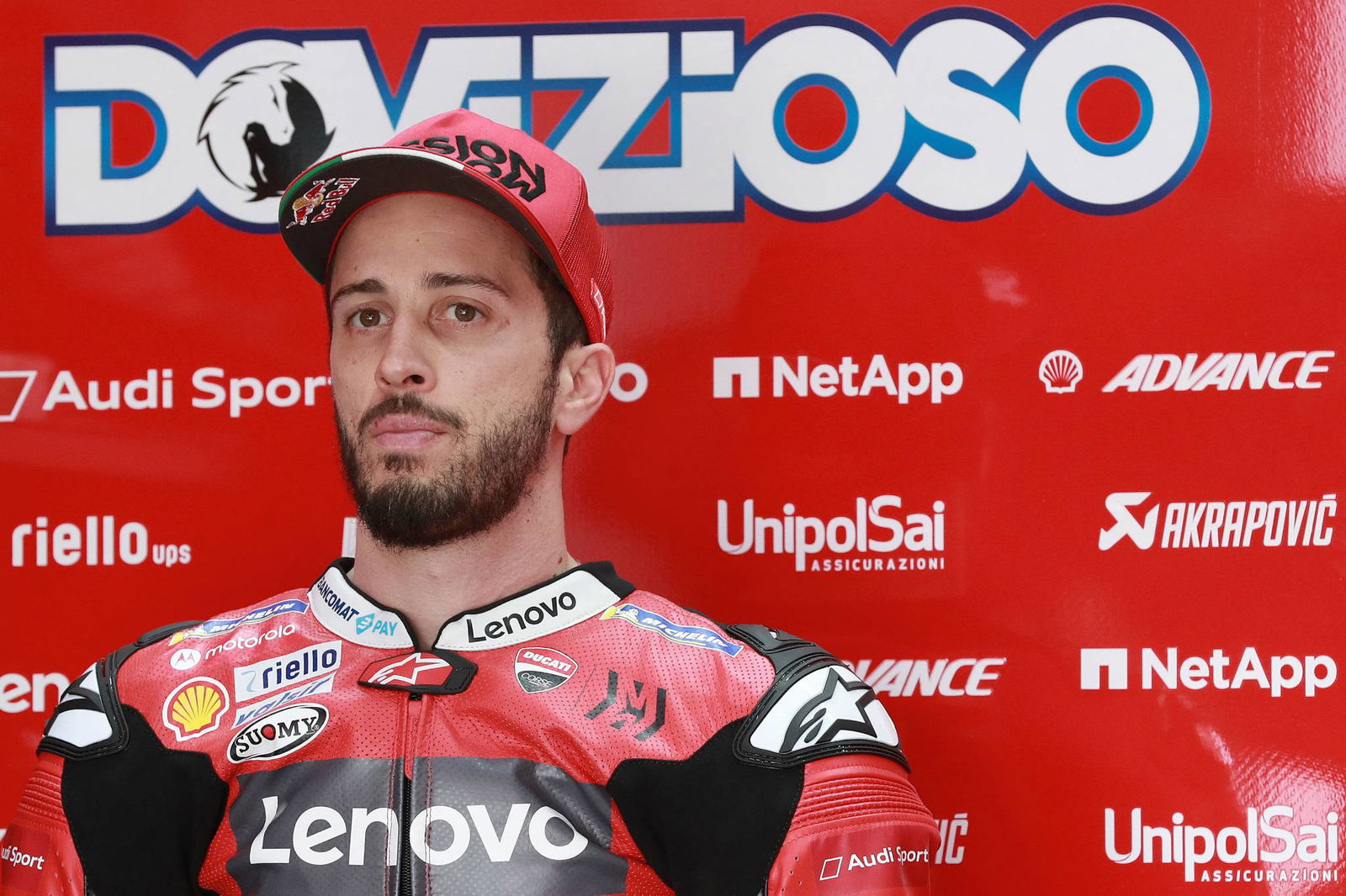 Marquez slows for Petrucci battle, Ducati rider down