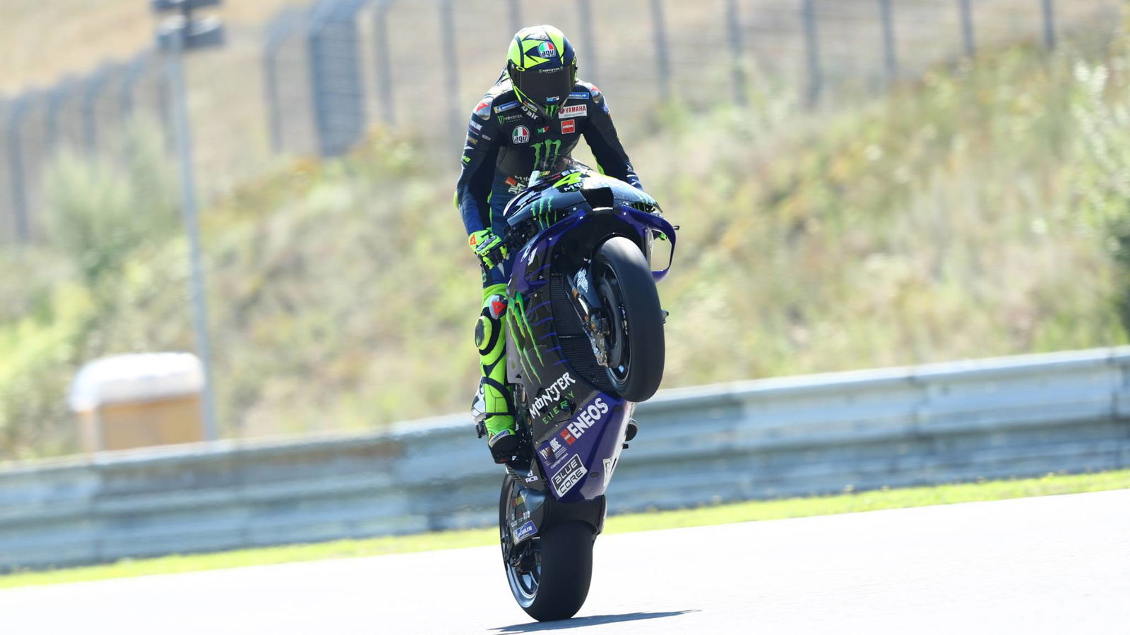Rossi 'improves bike a lot, competition incredible'