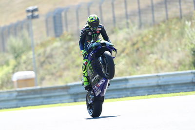 Rossi 'improves bike a lot, competition incredible'