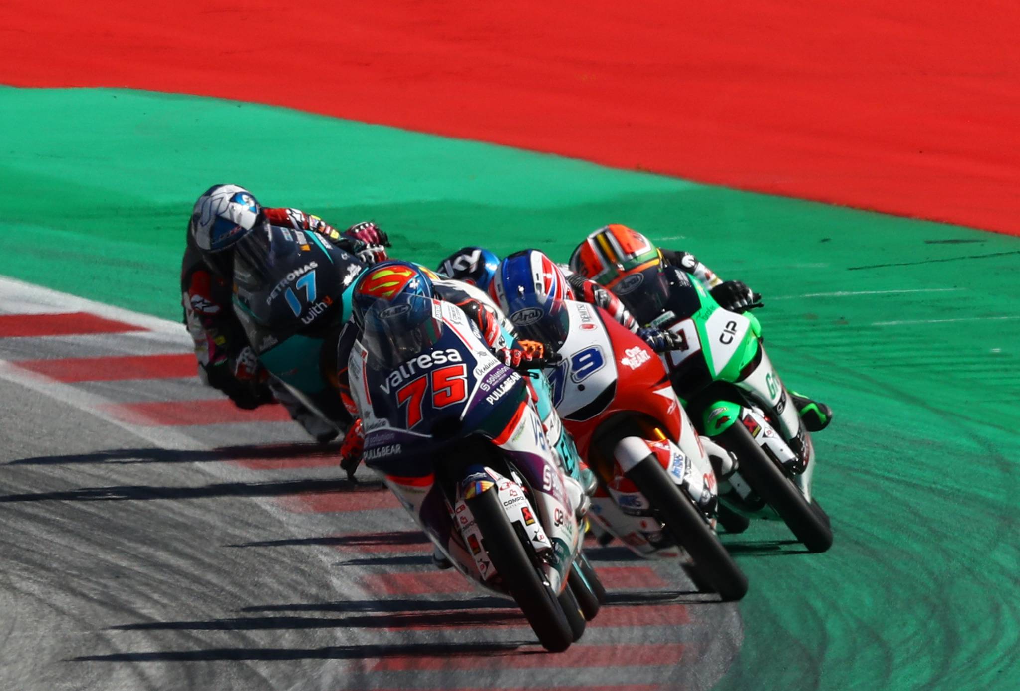 Albert Arenas leads coming out of last orner, Ai Ogura and Darryn Binder on green area and get penalised. Moto3, Austrian MotoGP . 16 August 2020
