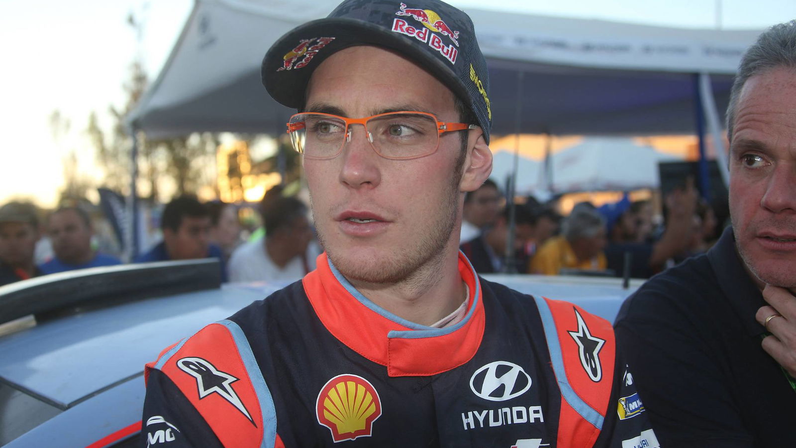 Neuville avoids injury in crash off bridge