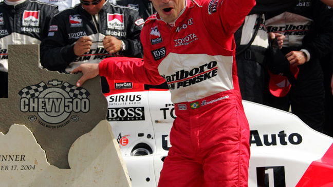 Castroneves climbs fence at Richmond.