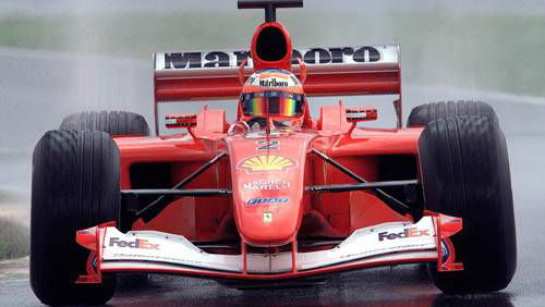 Barrichello tops wet Sepang warm-up.