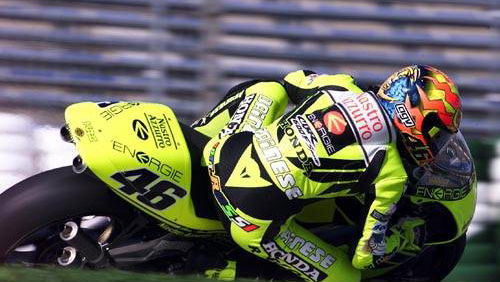 Rossi claims historic win for Honda.
