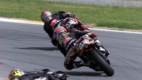 Lucchi leads, as Aprilia's attack on home ground.