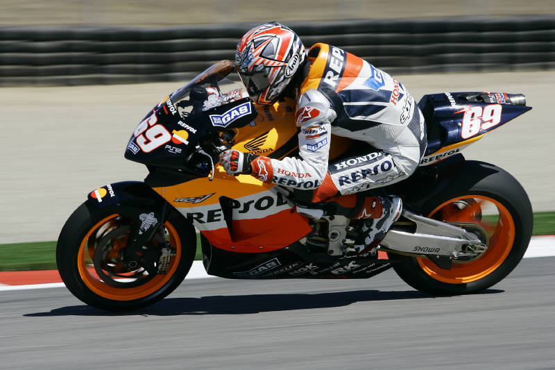 Biaggi, Melandri, Gibernau buried in the pack.