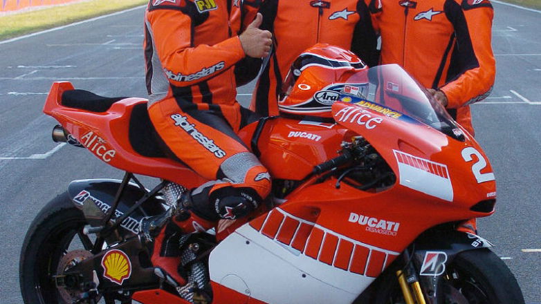 Ferrari F1 test driver takes two-seater ride.