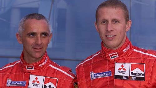 Mitsubishi drivers celebrate success in Tokyo.