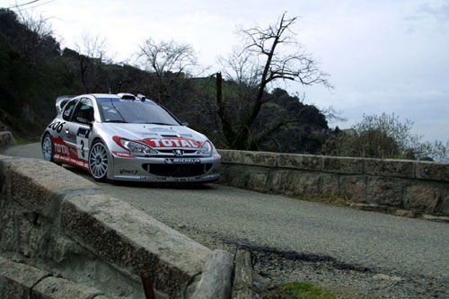 Rain fails to dampen Ford's Corsican rally hopes.