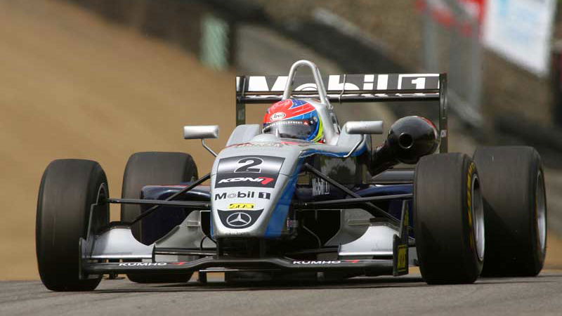Grosjean wins 'crazy' wet race.