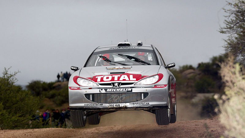 Burns wins for Peugeot, Gronholm excluded.