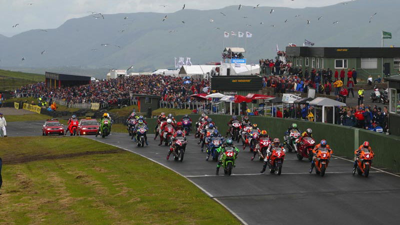 Cowie wins Thruxton Ducati Monster S4 challenge.