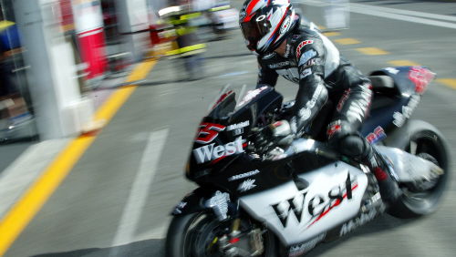 Capirossi bails out as wall approaches.