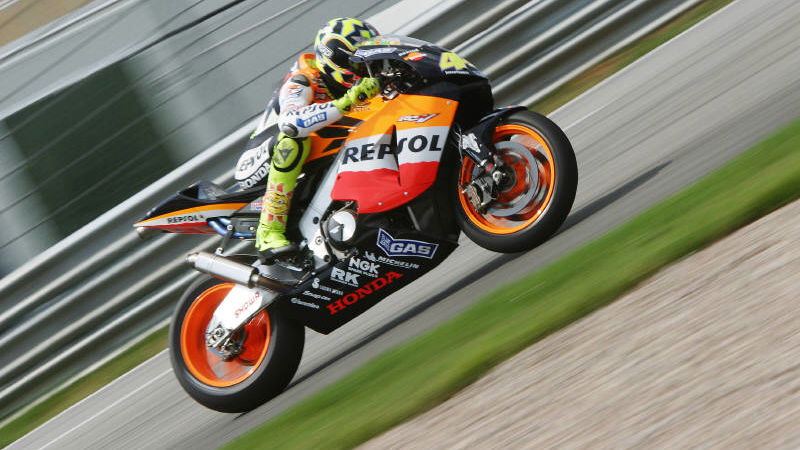 Rossi leads warm-up, Capirossi has fiery accident.