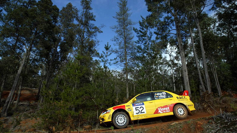 Podium for Mitsubishi and McShea.