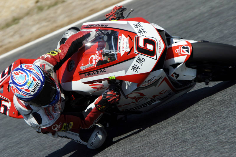Picture: Edwards slides his Aprilia.