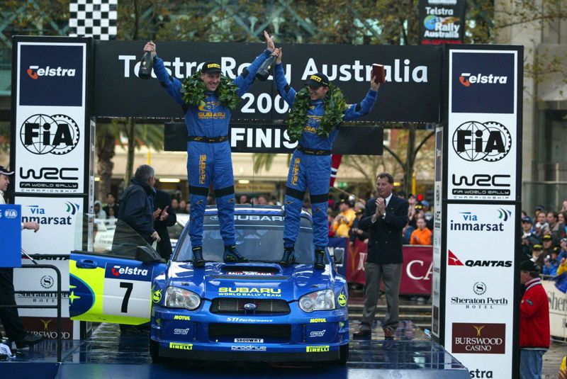 Podium for Mitsubishi and McShea.