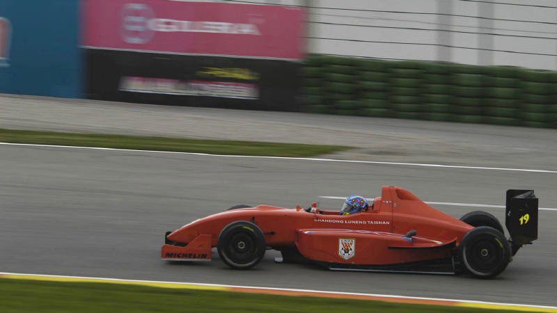 Jacque tests single-seater racer.