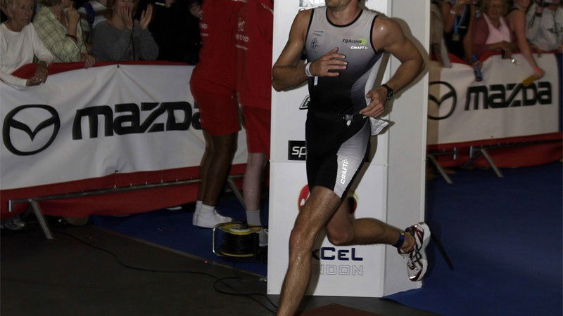 Personal best for Button in London triathlon.