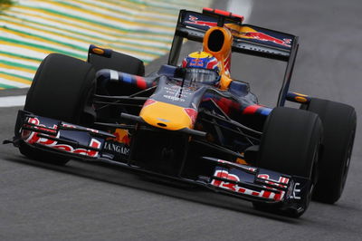 Webber wins, but Button on top of the world