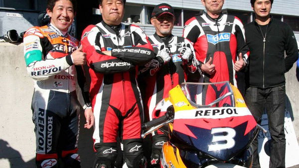 Honda bosses enter mini bike race.
