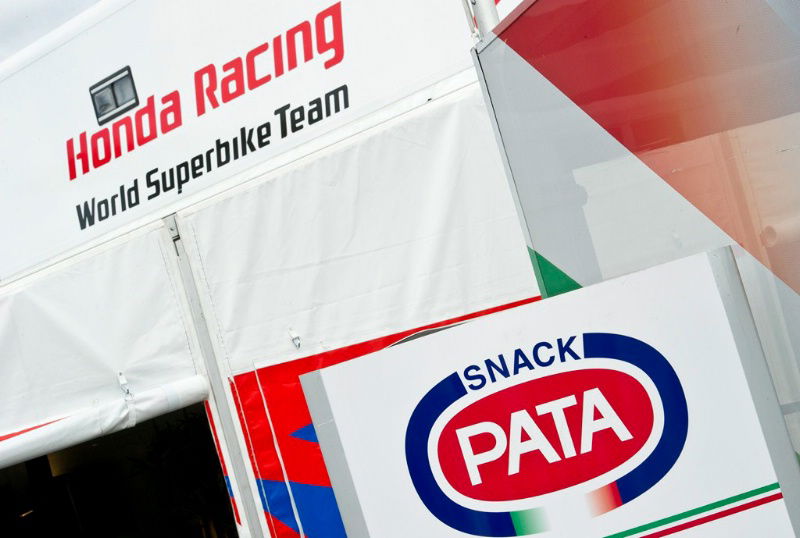 Red flag halts race, Melandri already out
