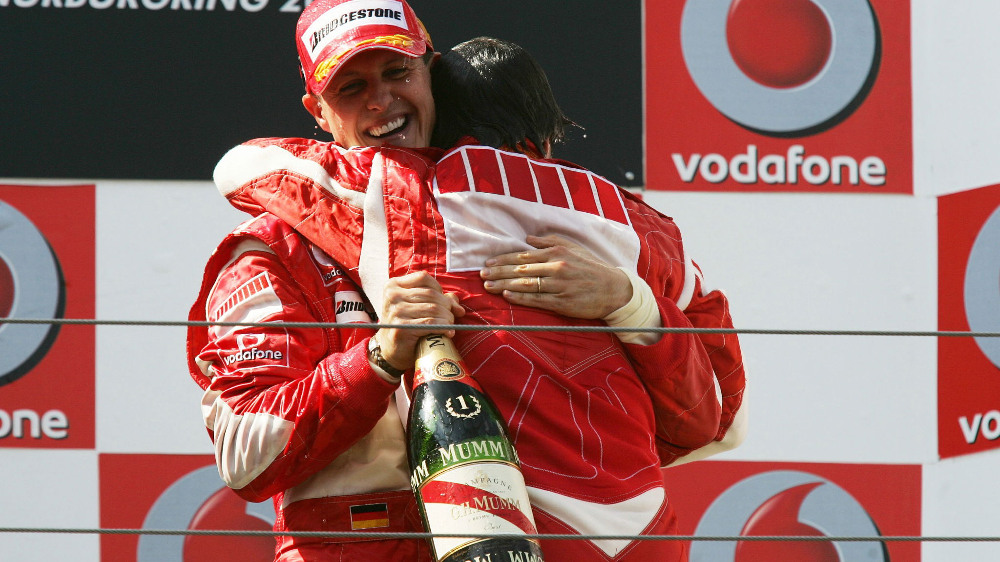  Nürburg, Germany,
Michael Schumacher (GER), Scuderia Ferrari hugs Felipe Massa (BRA), Scuderia Ferrari - Formula 1 World
